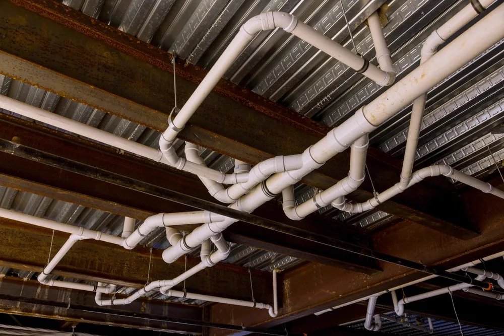 Neatly finished drainage pipework left clean and tidy after a completed job