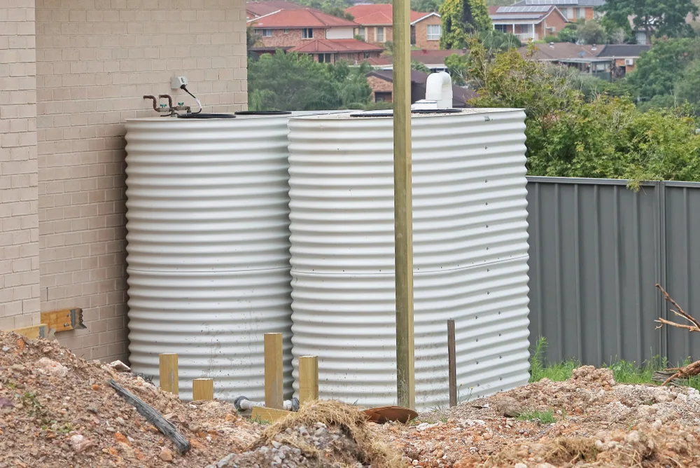 Onsite tanks installed beside a Brisbane home as part of a septic system