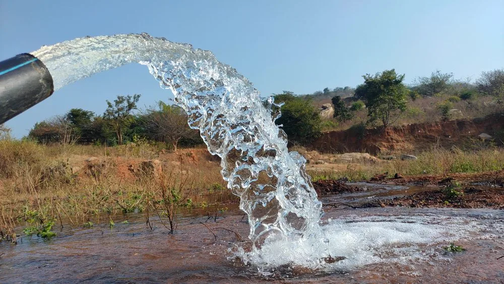 Stormwater discharging from a drainage outlet pipe after heavy rain
